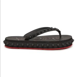 CHRISTIAN LOUBOUTIN
Loubi Donna Spike Red Sole Flip Flops